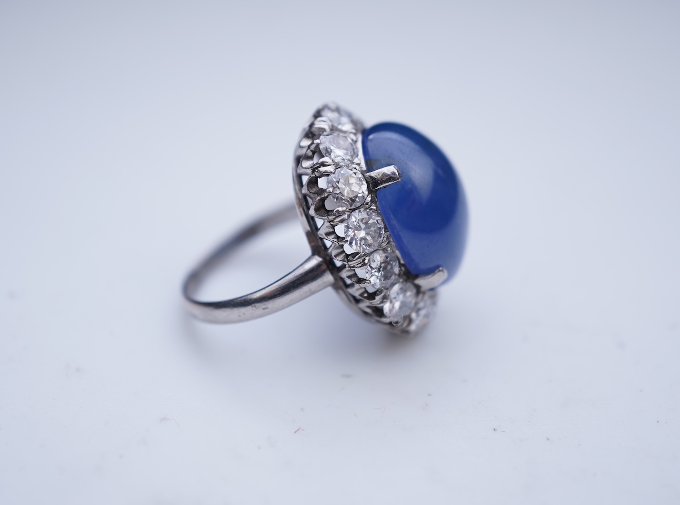 A sapphire and diamond ring, mid 20th century